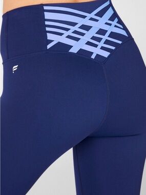 Fabletics Navy Blue Leggings with Light Blue Crisscross Waist Panel